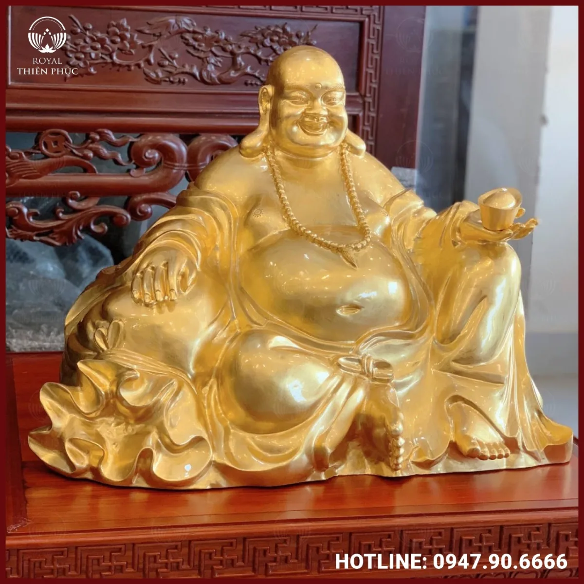 Tượng Phật Di Lặc bằng đồng cầm thỏi vàng