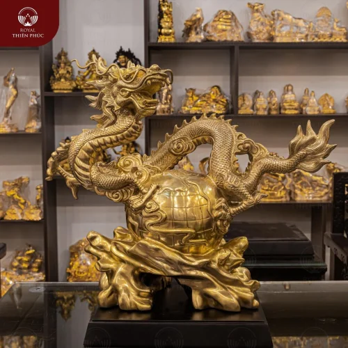 Tượng con rồng bay lượn quanh địa cầu bằng đồng catut cao 45cm