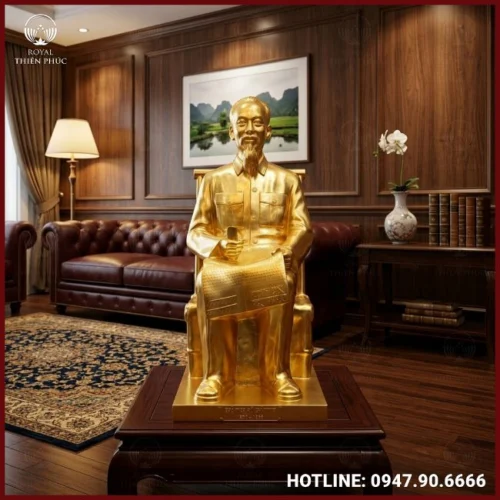 Tượng Bác Hồ ngồi đọc báo bằng đồng thếp vàng 9999